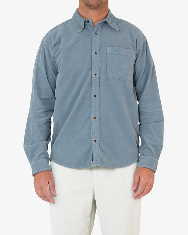 blue oversized long sleeve shirt with classic collar, single chest pocket, embroidered logo, 100% cotton corduroy fabrication with a vintage stone wash
